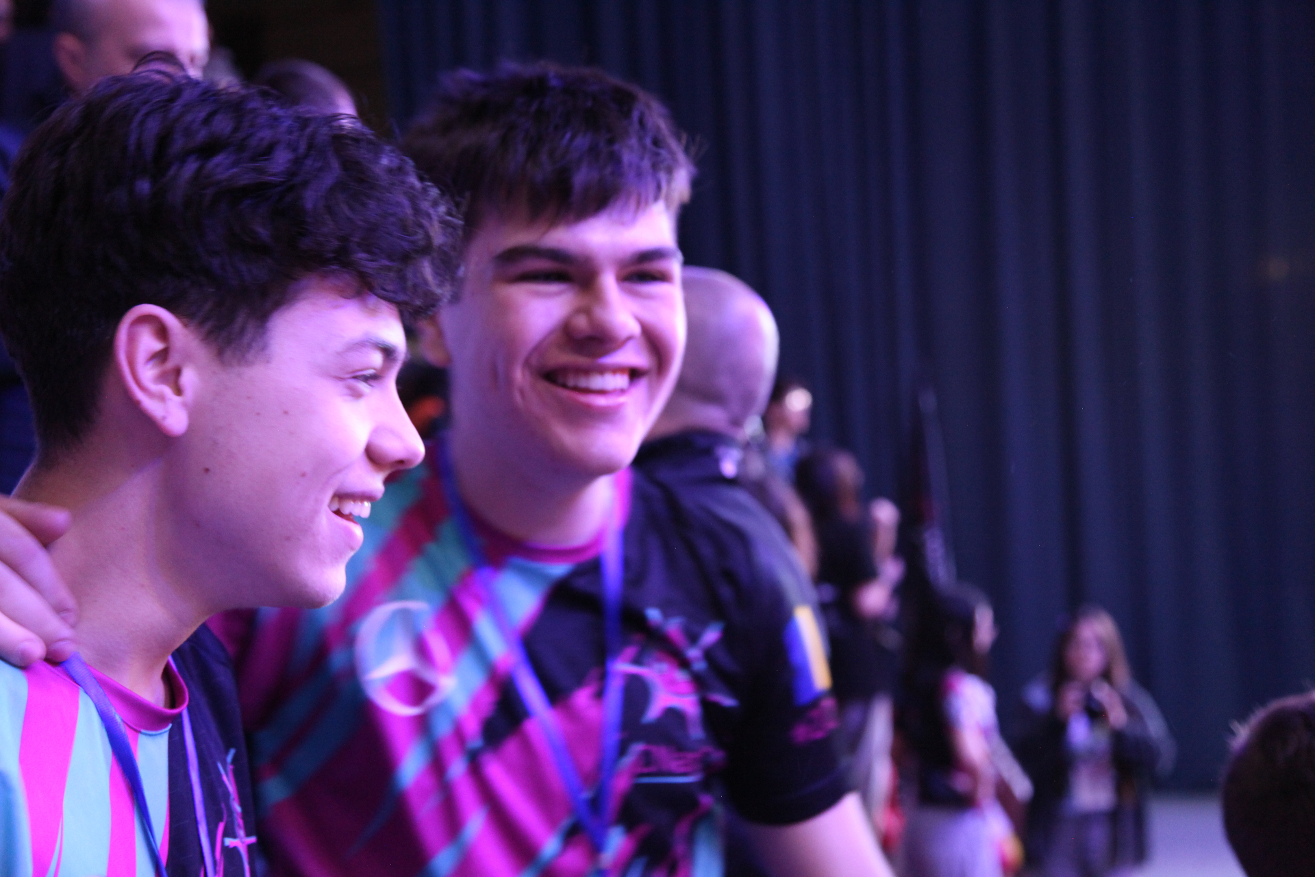 Two CNapSys teammates laughing together